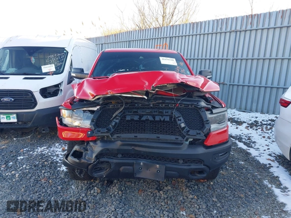 2021 Ram 1500 Rebel with VIN 1C6SRFLT2MN591844, listed as a IAAI auction lot 40410248 with 84,759 mi miles and . Bid and sale history available at DreamBid. Image 12.