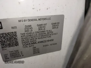 2021 GMC Acadia SLT with VIN 1GKKNML4XMZ209400, listed as a IAAI auction lot 41865093 with 63,947 mi miles. Bid and sale history available at carsss.com. Image 9.