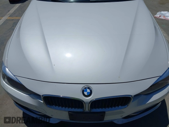 2013 BMW 3 Series 328i xDrive with VIN WBA3B3C56DJ698238, listed as a IAAI auction lot 42333709 with 82,167 mi miles and . Bid and sale history available at DreamBid. Image 6.
