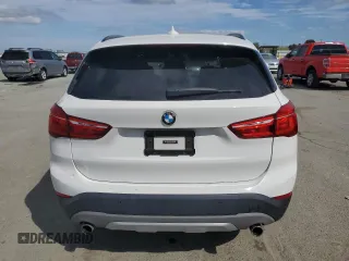 2017 BMW X1 sDrive28i with VIN WBXHU7C39H5H37756, listed as a Copart auction lot 50769975 with 82,479 mi miles and Salvage Title. Bid and sale history available at carsss.com. Image 6.