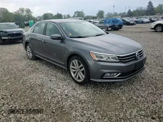 2017 Volkswagen Passat SE z VIN 1VWGT7A3XHC053786, wystawiony jako Copart lot #55421435 z przebiegiem 90 878 mil mil oraz Szkoda całkowita • Salvage title. Historia ofert i sprzedaży dostępna na DreamBid. Obrazek 13.