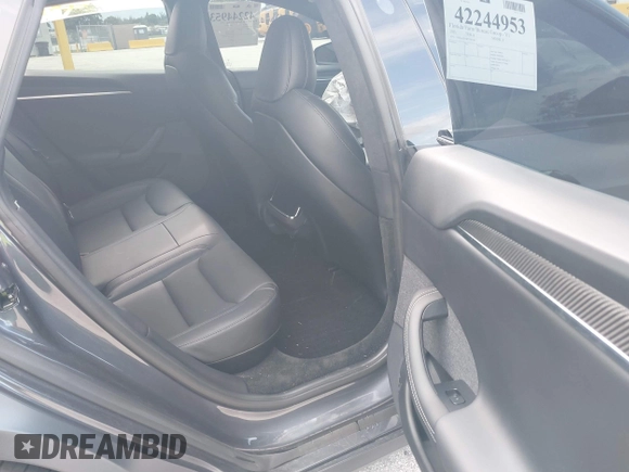 2023 Tesla Model S with VIN 5YJSA1E54PF501565, listed as a IAAI auction lot 42244953 with Not provided miles and . Bid and sale history available at DreamBid. Image 8.