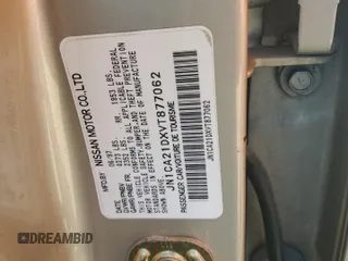 1997 Nissan Maxima GXE z VIN JN1CA21DXVT877062, wystawiony jako Copart lot #49411185 z przebiegiem 249 941 mil mil oraz Szkoda całkowita • Salvage title. Historia ofert i sprzedaży dostępna na DreamBid. Obrazek 14.