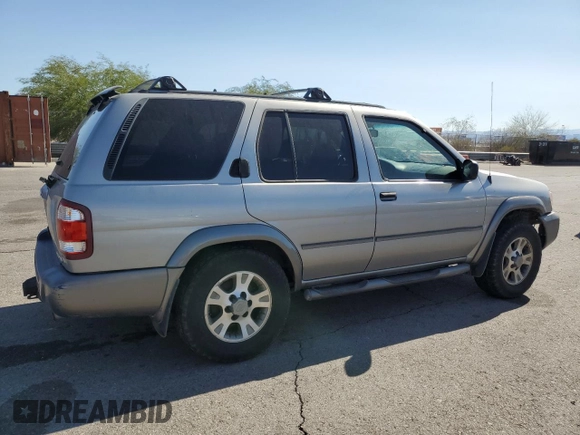 2001 Nissan Pathfinder SE с VIN JN8DR07Y71W520959, выставлен на аукционе Copart как лот 72599614 с пробегом 186 415 миль миль и Списание • Salvage title. История ставок и продаж доступна на DreamBid. Изображение 3.