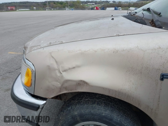 1997 Ford F-150 with VIN 2FTEX17L2VCA10536, listed as a IAAI auction lot 41917990 with 296,879 mi miles and . Bid and sale history available at DreamBid. Image 6.