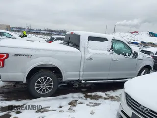 2018 Ford F-150 XL with VIN 1FTFW1E54JKC59793, listed as a IAAI auction lot 41558134 with 217,831 mi miles. Bid and sale history available at carsss.com. Image 13.