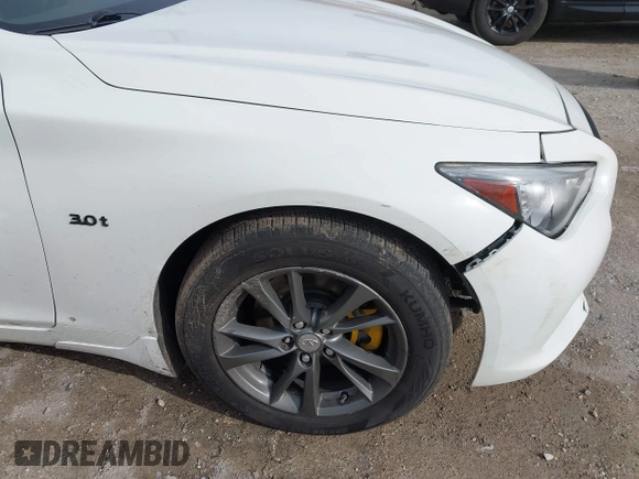 2017 Infiniti Q50 Premium with VIN JN1EV7AR1HM841541, listed as a IAAI auction lot 41876174 with 64,552 mi miles and . Bid and sale history available at carsss.com. Image 17.