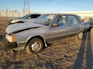 1986 Toyota Camry z VIN JT2SV12E9G0477991, wystawiony jako Copart lot #85531214 z przebiegiem 297 033 mil mil oraz Czysty tytuł • Clean title. Historia ofert i sprzedaży dostępna na DreamBid. Obrazek 1.