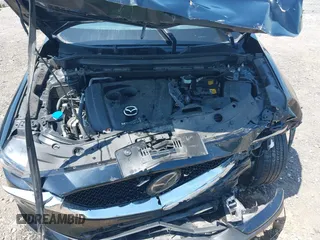 2020 Mazda CX-5 Grand Touring with VIN JM3KFADM9L1837183, listed as a IAAI auction lot 42340628 with 81,975 mi miles and . Bid and sale history available at DreamBid. Image 10.