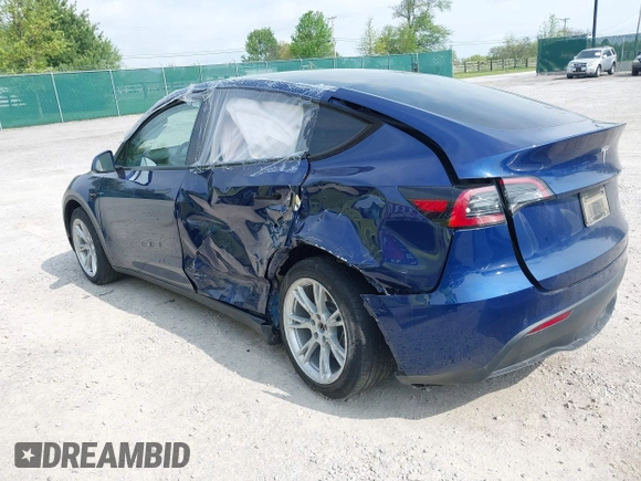2022 Tesla Model Y Long Range z VIN 7SAYGDEE3NF455544, wystawiony jako IAAI lot #42123963 z przebiegiem 23 882 mil mil oraz . Historia ofert i sprzedaży dostępna na DreamBid. Obrazek 3.