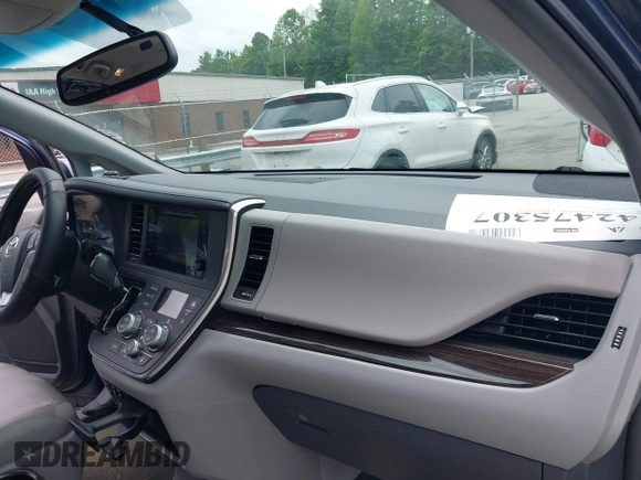 2015 Toyota Sienna XLE with VIN 5TDYK3DC3FS676919, listed as a IAAI auction lot 42475307 with 99,574 mi miles and . Bid and sale history available at DreamBid. Image 5.