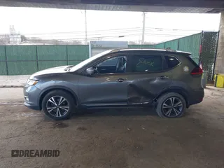2017 Nissan Rogue SL with VIN 5N1AT2MV3HC761513, listed as a IAAI auction lot 42059096 with 75,250 mi miles and . Bid and sale history available at DreamBid. Image 14.
