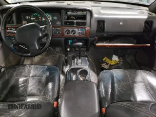 1997 Jeep Grand Cherokee Limited with VIN 1J4GZ78Y3VC733618, listed as a Copart auction lot 53757095 with 150,806 mi miles and Salvage title. Bid and sale history available at DreamBid. Image 8.