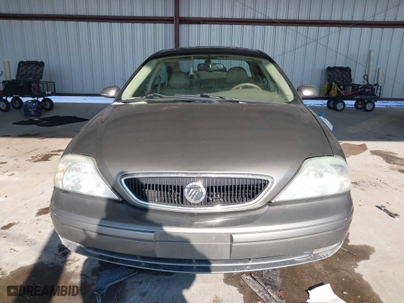 2003 Mercury Sable LS Premium with VIN 1MEFM55S43A631966, listed as a IAAI auction lot 41408623 with 130,010 mi miles. Bid and sale history available at carsss.com. Image 12.