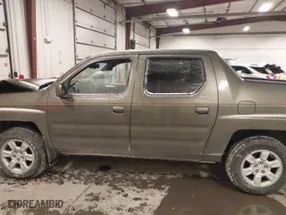 2006 Honda Ridgeline RTL with VIN 2HJYK16546H503553, listed as a IAAI auction lot 41598667 with 197,202 mi miles. Bid and sale history available at carsss.com. Image 14.