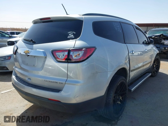 2015 Chevrolet Traverse LS with VIN 1GNKRFEDXFJ388491, listed as a IAAI auction lot 41700140 with 156,233 mi miles and . Bid and sale history available at DreamBid. Image 4.