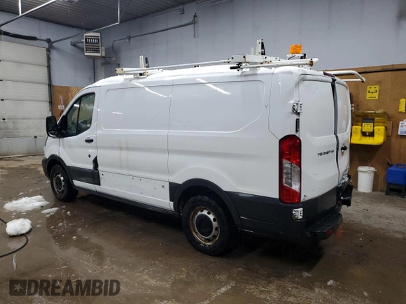 2015 Ford Transit Cargo with VIN 1FTNE1ZM0FKA59369, listed as a Copart auction lot 87335004 with 124,883 mi miles and Clean Title. Bid and sale history available at carsss.com. Image 2.