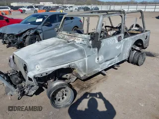 2005 Jeep Wrangler Unlimited with VIN 1J4FA44S55P366393, listed as a IAAI auction lot 41849008 with 0 mi miles. Bid and sale history available at carsss.com. Image 2.