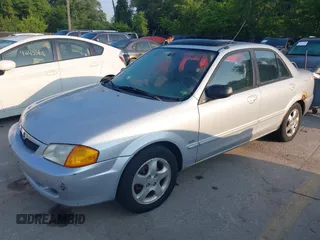 1999 Mazda Protege ES z VIN JM1BJ2212X0194256, wystawiony jako IAAI lot #42452060 z przebiegiem 208 002 mil mil oraz . Historia ofert i sprzedaży dostępna na DreamBid. Obrazek 2.