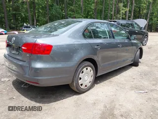 2014 Volkswagen Jetta SE with VIN 3VWD07AJ0EM236487, listed as a IAAI auction lot 42714441 with 124,596 mi miles and . Bid and sale history available at DreamBid. Image 4.