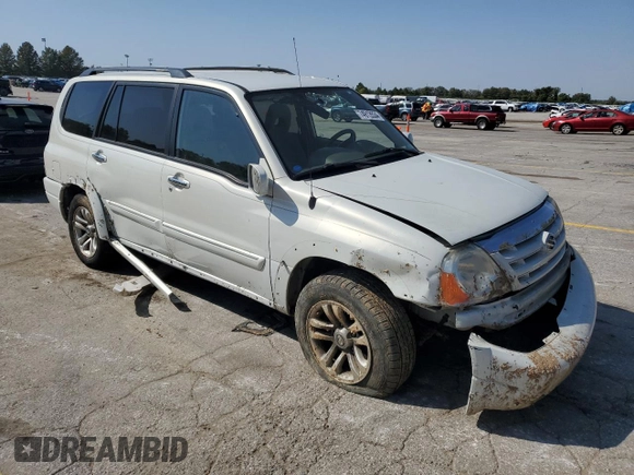2005 Suzuki XL7 LX z VIN JS3TX92VX54100730, wystawiony jako Copart lot #74913534 z przebiegiem 91 838 mil mil oraz Szkoda całkowita • Salvage title. Historia ofert i sprzedaży dostępna na DreamBid. Obrazek 4.
