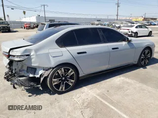 2023 BMW 7 Series 740i with VIN WBA23EH09PCM67327, listed as a Copart auction lot 73387174 with 18,228 mi miles and Salvage Title. Bid and sale history available at carsss.com. Image 3.