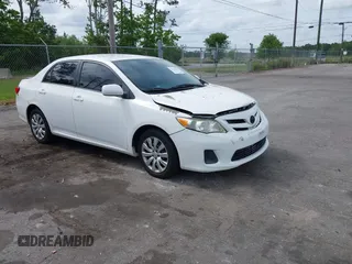 2012 Toyota Corolla L with VIN 5YFBU4EE5CP044613, listed as a IAAI auction lot 42113624 with 208,780 mi miles. Bid and sale history available at carsss.com. Image 1.