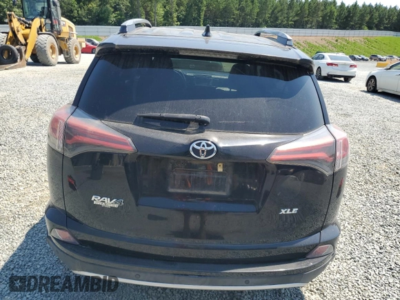 2018 Toyota RAV4 XLE with VIN 2T3WFREV6JW495822, listed as a Copart auction lot 62555325 with 88,808 mi miles and Salvage title. Bid and sale history available at DreamBid. Image 6.