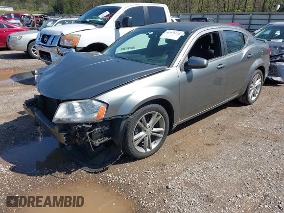 2013 Dodge Avenger SXT with VIN 1C3CDZCG7DN585431, listed as a IAAI auction lot 41975228 with 152,703 mi miles and . Bid and sale history available at carsss.com. Image 2.