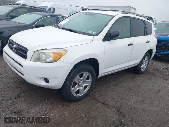 2006 Toyota RAV4 with VIN JTMBD33VX65015543, listed as a IAAI auction lot 41986857 with 124,709 mi miles. Bid and sale history available at carsss.com. Image 2.