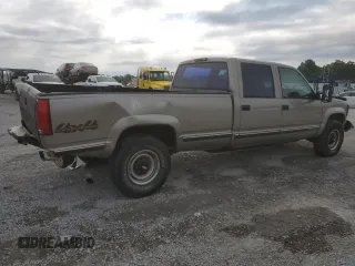 1999 Chevrolet Silverado 3500 z VIN 1GCHK33R4XF096473, wystawiony jako Copart lot #65189104 z przebiegiem 174 416 mil mil oraz Szkody całkowita. Historia ofert i sprzedaży dostępna na DreamBid. Obrazek 3.