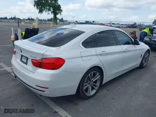 2016 BMW 4 Series 428i with VIN WBA4A9C51GGL88011, listed as a IAAI auction lot 41852057 with 117,669 mi miles. Bid and sale history available at carsss.com. Image 4.