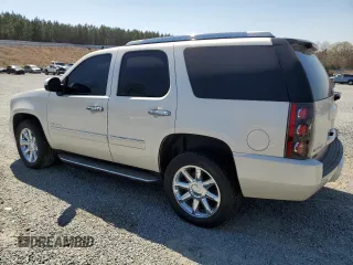 2013 GMC Yukon Denali with VIN 1GKS2EEF0DR326058, listed as a Copart auction lot 50707535 with 156,764 mi miles and Salvage Title. Bid and sale history available at carsss.com. Image 2.