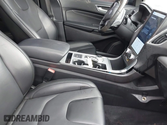 2021 Ford Edge Titanium z VIN 2FMPK4K94MBA32297, wystawiony jako IAAI lot #41834740 z przebiegiem 45 908 mil mil oraz . Historia ofert i sprzedaży dostępna na DreamBid. Obrazek 5.