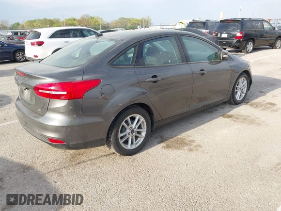 2017 Ford Focus SE with VIN 1FADP3F21HL228709, listed as a IAAI auction lot 42047685 with 41,107 mi miles and . Bid and sale history available at DreamBid. Image 4.
