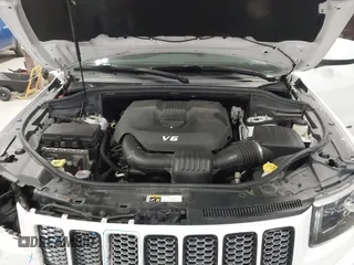 2015 Jeep Grand Cherokee Laredo with VIN 1C4RJFAG4FC747532, listed as a IAAI auction lot 41764541 with 196,385 mi miles. Bid and sale history available at carsss.com. Image 10.