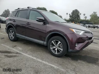 2016 Toyota RAV4 XLE with VIN 2T3WFREV2GW297912, listed as a Copart auction lot 53116605 with 33,155 mi miles and Salvage Title. Bid and sale history available at carsss.com. Image 4.