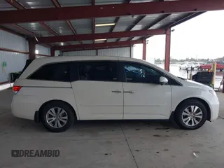 2015 Honda Odyssey EX-L with VIN 5FNRL5H64FB084175, listed as a IAAI auction lot 41943540 with 67,902 mi miles and . Bid and sale history available at carsss.com. Image 13.