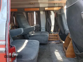 1989 Chevrolet Chevy Van z VIN 1GBEG25K1K7188534, wystawiony jako Copart lot #65769724 z przebiegiem 72 888 mil mil oraz Nie do naprawy. Historia ofert i sprzedaży dostępna na DreamBid. Obrazek 11.