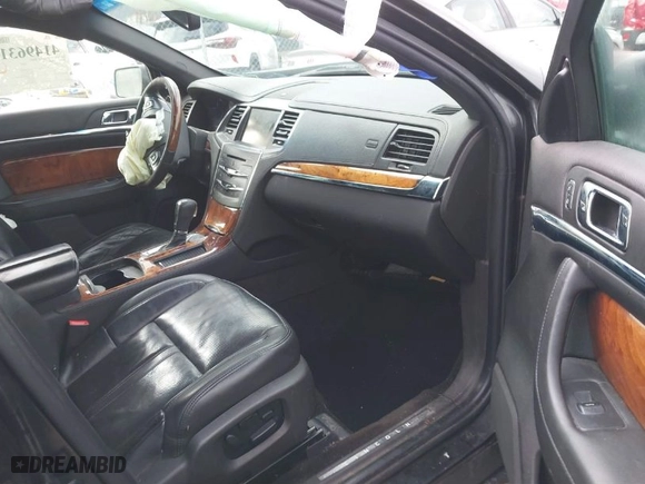 2014 Lincoln MKS with VIN 1LNHL9DK3EG601956, listed as a IAAI auction lot 41496313 with 191,087 mi miles. Bid and sale history available at carsss.com. Image 5.