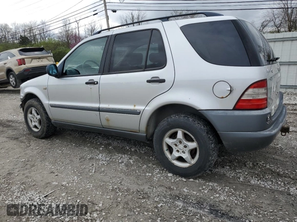 1999 Mercedes-Benz M 320/430/500 with VIN 4JGAB54E9XA127797, listed as a Copart auction lot 51408235 with 243,566 mi miles and Salvage title. Bid and sale history available at DreamBid. Image 2.