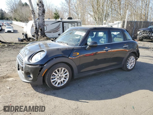 2016 MINI Hardtop 4 Door with VIN WMWXU1C57G2E16741, listed as a Copart auction lot 48392355 with 72,662 mi miles and Salvage Title. Bid and sale history available at DreamBid. Image 1.
