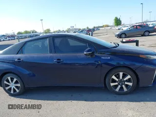 2016 Toyota Mirai with VIN JTDBVRBD6GA000989, listed as a IAAI auction lot 42098383 with 63,686 mi miles and . Bid and sale history available at DreamBid. Image 13.