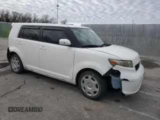 2010 Scion xB with VIN JTLZE4FE5A1105779, listed as a Copart auction lot 87167404 with 255,623 mi miles and Salvage Title. Bid and sale history available at DreamBid. Image 4.