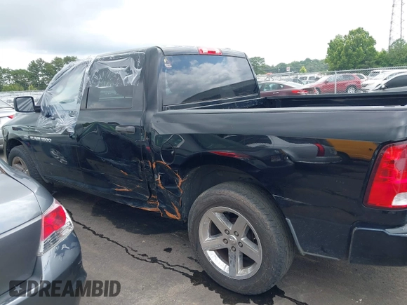 2012 Ram 1500 Express with VIN 1C6RD6KT1CS281120, listed as a IAAI auction lot 42548941 with 244,272 mi miles and . Bid and sale history available at DreamBid. Image 14.