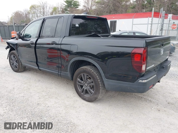 2019 Honda Ridgeline Sport with VIN 5FPYK3F10KB046552, listed as a IAAI auction lot 41983384 with 77,229 mi miles and . Bid and sale history available at DreamBid. Image 3.