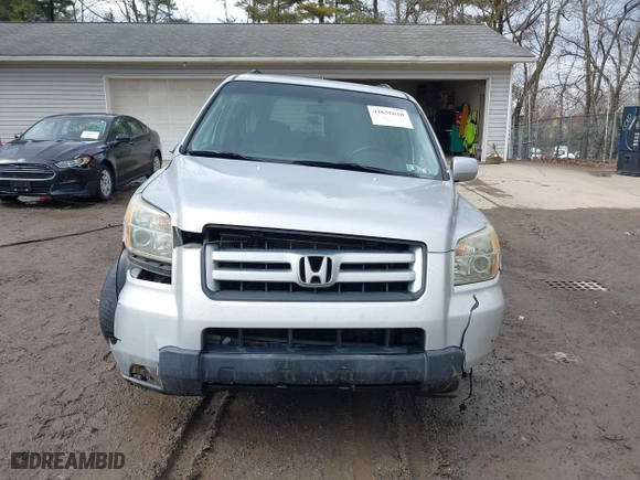 2006 Honda Pilot EX with VIN 2HKYF18426H553632, listed as a IAAI auction lot 41656610 with 154,470 mi miles. Bid and sale history available at carsss.com. Image 13.