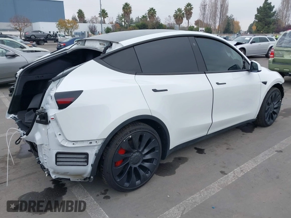2022 Tesla Model Y Performance z VIN 7SAYGDEFXNF484838, wystawiony jako IAAI lot #41392095 z przebiegiem 8 728 mil mil oraz . Historia ofert i sprzedaży dostępna na DreamBid. Obrazek 4.