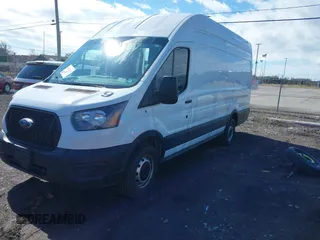 2023 Ford Transit Cargo with VIN 1FTBR3X86PKA69978, listed as a IAAI auction lot 41815672 with 60,590 mi miles and . Bid and sale history available at DreamBid. Image 2.