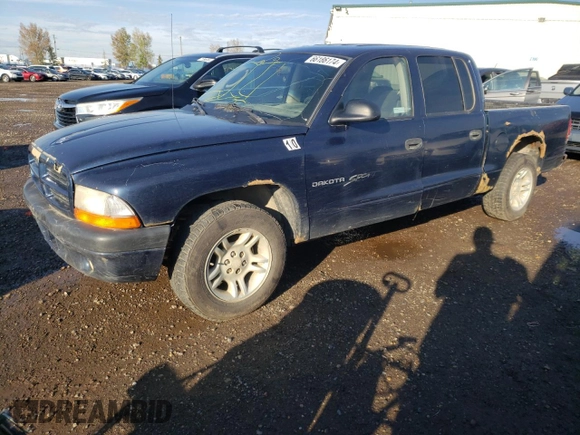 2001 Dodge Dakota Sport z VIN 1B7HL2AN51S225570, wystawiony jako Copart lot #66186174 z przebiegiem 295 142 mil mil oraz Szkoda całkowita • Salvage title. Historia ofert i sprzedaży dostępna na DreamBid. Obrazek 1.